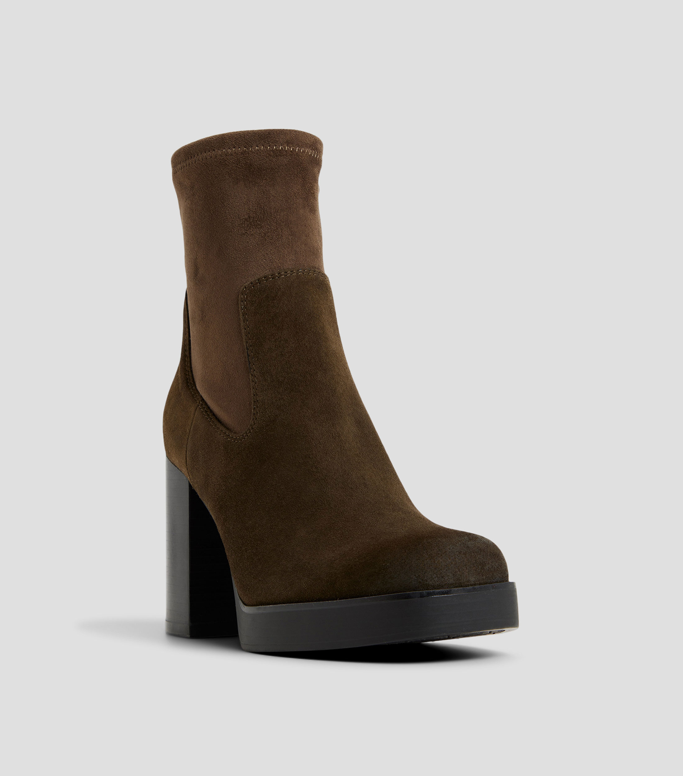Botines en piel de tacón alto de media luna Mujer